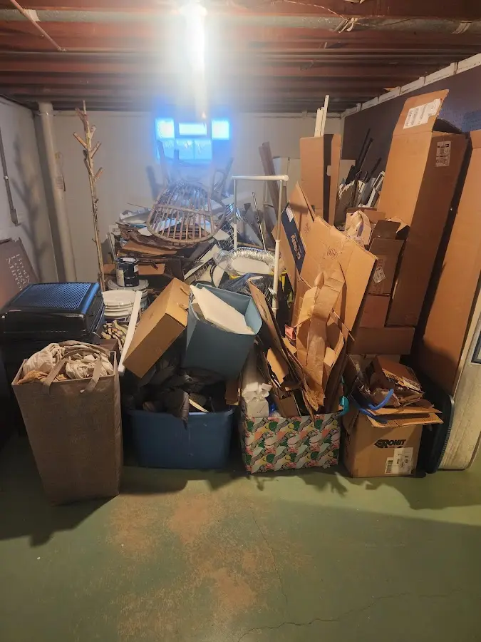 Roll-off dumpster container at job site for 2 Yard Dumpster Rental in Wellington